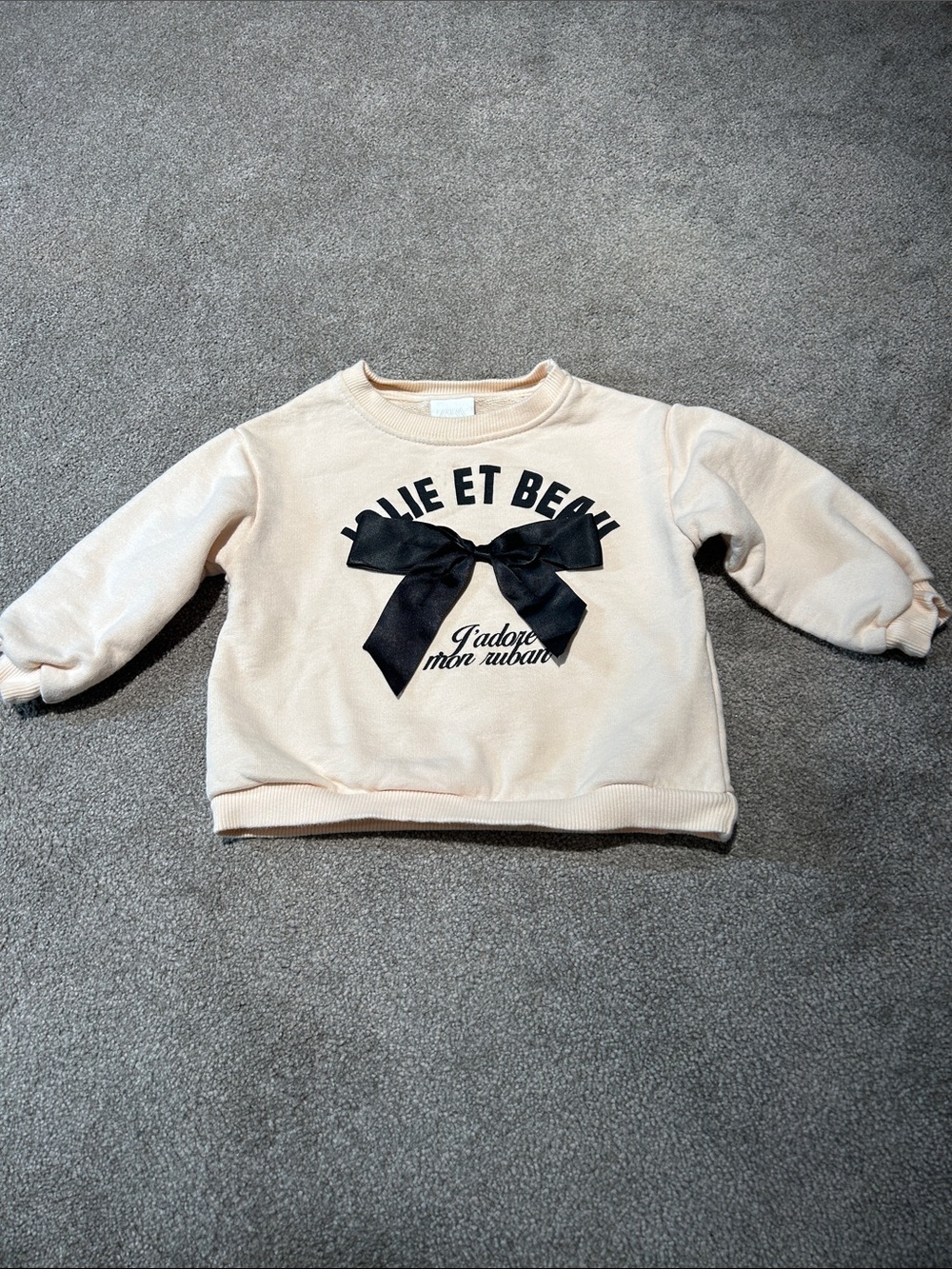 Zara Kids Cream Sweatshirt with Black Bow Graphic